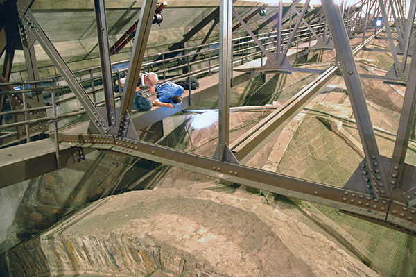 As part of pre-restoration work, engineers have performed hands-on inspection throughout Duke Chapel to check structural integrity. Photo courtesy of Ray Walker.